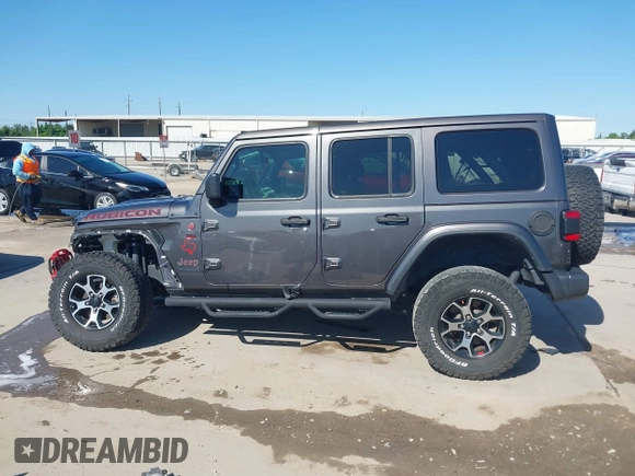 2020 Jeep Wrangler Unlimited Rubicon z VIN 1C4HJXFN0LW300344, wystawiony jako IAAI lot #41943662 z przebiegiem 59 051 mil mil oraz . Historia ofert i sprzedaży dostępna na DreamBid. Obrazek 14.
