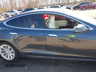 2017 Tesla Model S 100D with VIN 5YJSA1E22HF210635, listed as a IAAI auction lot 41854125 with 112,323 mi miles. Bid and sale history available at carsss.com. Image 14.