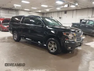 2017 Chevrolet Suburban LT with VIN 1GNSKHKC4HR247982, listed as a IAAI auction lot 41424143 with 157,121 mi miles. Bid and sale history available at carsss.com. Image 1.