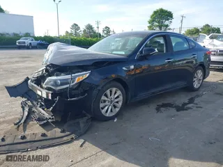 2016 Kia Optima EX with VIN 5XXGU4L3XGG033323, listed as a IAAI auction lot 42088998 with 134,686 mi miles. Bid and sale history available at carsss.com. Image 17.