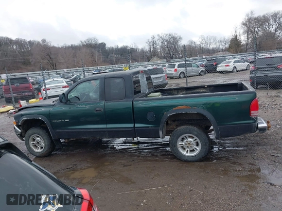 2000 Dodge Dakota Sport with VIN 1B7GG22N3YS539484, listed as a IAAI auction lot 41748568 with 290,117 mi miles. Bid and sale history available at carsss.com. Image 14.
