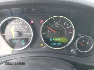 2016 Jeep Wrangler Unlimited Sahara z VIN 1C4HJWEG5GL172350, wystawiony jako IAAI lot #39987533 z przebiegiem 158 540 mil mil oraz . Historia ofert i sprzedaży dostępna na DreamBid. Obrazek 7.
