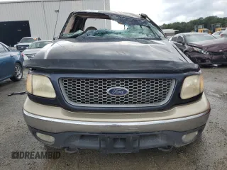 1999 Ford F-250 z VIN 1FTPX28L2XKA25212, wystawiony jako Copart lot #74911064 z przebiegiem Nie podano mil oraz Szkoda całkowita • Salvage title. Historia ofert i sprzedaży dostępna na DreamBid. Obrazek 5.