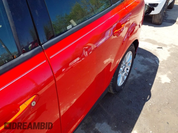 2012 Ford Focus SE z VIN 1FAHP3F23CL333598, wystawiony jako IAAI lot #41970172 z przebiegiem 209 969 mil mil oraz . Historia ofert i sprzedaży dostępna na DreamBid. Obrazek 19.