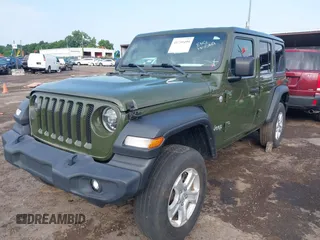 2021 Jeep Wrangler Unlimited Willys with VIN 1C4HJXDM9MW577585, listed as a IAAI auction lot 41739499 with 47,076 mi miles and . Bid and sale history available at DreamBid. Image 2.