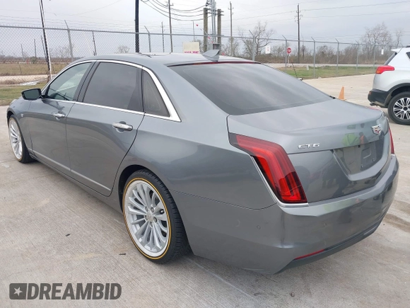 2018 Cadillac CT6 Luxury RWD z VIN 1G6KC5RX4JU159789, wystawiony jako IAAI lot #41145010 z przebiegiem 73 811 mil mil oraz . Historia ofert i sprzedaży dostępna na DreamBid. Obrazek 3.