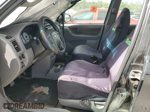 2001 Ford Escape with VIN 1FMYU03B91KC56563, listed as a Copart auction lot 81233934 with 173,775 mi miles and Non repairable. Bid and sale history available at DreamBid. Image 7.