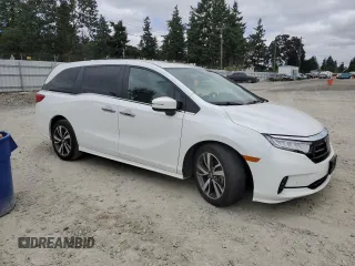 2022 Honda Odyssey Touring with VIN 5FNRL6H8XNB016064, listed as a Copart auction lot 65289595 with 24,946 mi miles and Salvage title. Bid and sale history available at DreamBid. Image 4.