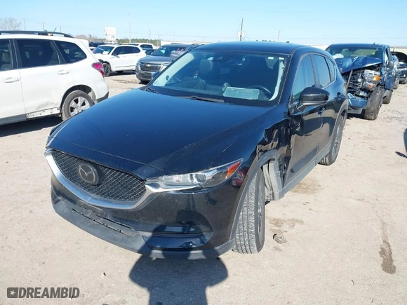 2020 Mazda CX-5 Touring with VIN JM3KFACM6L0788435, listed as a IAAI auction lot 41630615 with NaN miles. Bid and sale history available at carsss.com. Image 2.