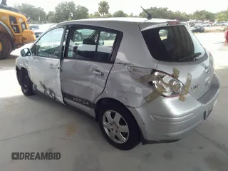 2009 Nissan Versa 1.8 SL with VIN 3N1BC13EX9L362594, listed as a IAAI auction lot 37762793 with 254,167 mi miles. Bid and sale history available at carsss.com. Image 3.