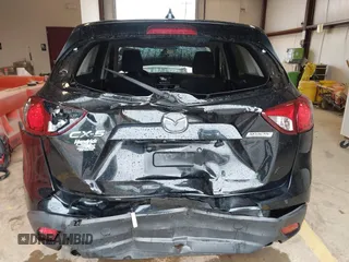 2016 Mazda CX-5 Touring with VIN JM3KE2CY7G0867355, listed as a IAAI auction lot 41963169 with 117,727 mi miles and . Bid and sale history available at DreamBid. Image 6.