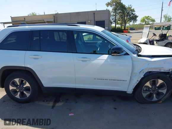 2022 Jeep Grand Cherokee with VIN 1C4RJYB66N8718018, listed as a IAAI auction lot 42002051 with Not provided miles and . Bid and sale history available at DreamBid. Image 12.