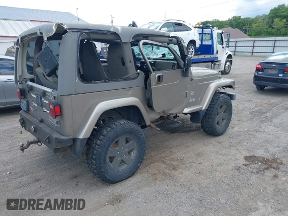 2004 Jeep Wrangler Sahara with VIN 1J4FA59S54P740417, listed as a IAAI auction lot 42382078 with 200,108 mi miles and . Bid and sale history available at DreamBid. Image 4.