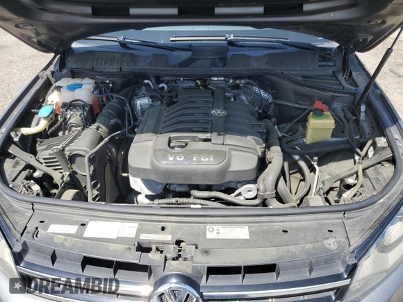 2012 Volkswagen Touareg Sport with VIN WVGEF9BP0CD010197, listed as a Copart auction lot 48480355 with 131,605 mi miles and Salvage Title. Bid and sale history available at DreamBid. Image 11.