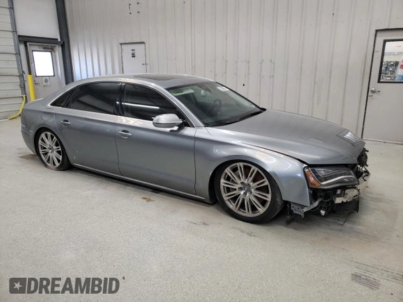 2014 Audi A8 4.0T с VIN WAUR2AFD8EN002992, выставлен на аукционе Copart как лот 45711745 с пробегом 135 881 миль миль и Чистый • Clean title. История ставок и продаж доступна на DreamBid. Изображение 4.