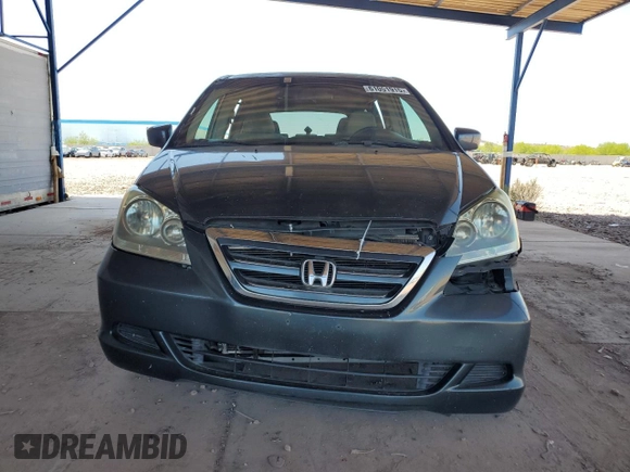 2006 Honda Odyssey EX with VIN 5FNRL384X6B461661, listed as a Copart auction lot 61051915 with 190,578 mi miles and Salvage title. Bid and sale history available at DreamBid. Image 5.
