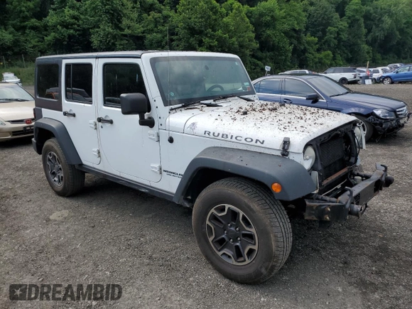 2014 Jeep Wrangler Unlimited Rubicon with VIN 1C4HJWFG4EL114743, listed as a Copart auction lot 61397575 with 110,222 mi miles and Salvage title. Bid and sale history available at DreamBid. Image 4.