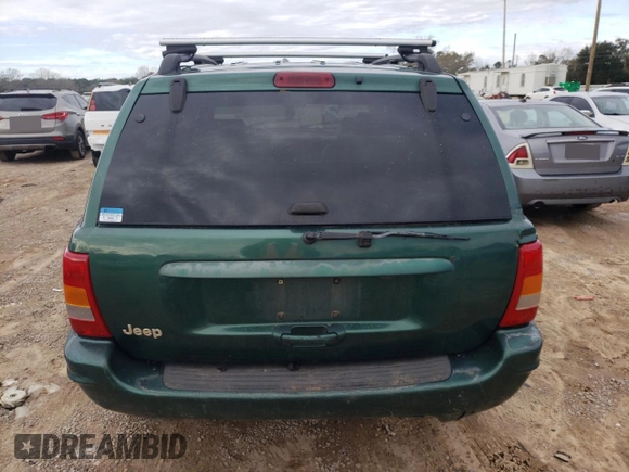 1999 Jeep Grand Cherokee Limited with VIN 1J4GW68S1XC744666, listed as a Copart auction lot 88337895 with 243,480 mi miles and Salvage Title. Bid and sale history available at carsss.com. Image 6.