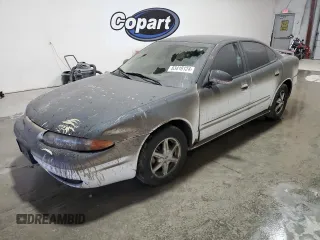 2002 Oldsmobile Alero GL1 z VIN 1G3NL52E52C139559, wystawiony jako Copart lot #83418124 z przebiegiem 199 600 mil mil oraz Szkoda całkowita • Salvage title. Historia ofert i sprzedaży dostępna na DreamBid. Obrazek 1.