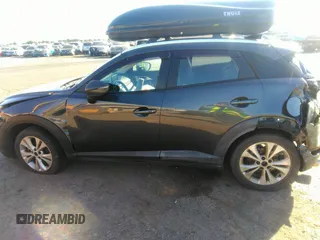 2017 Mazda CX-3 Touring z VIN JM1DKFC72H0142319, wystawiony jako IAAI lot #42223888 z przebiegiem 128 592 mil mil oraz . Historia ofert i sprzedaży dostępna na DreamBid. Obrazek 14.