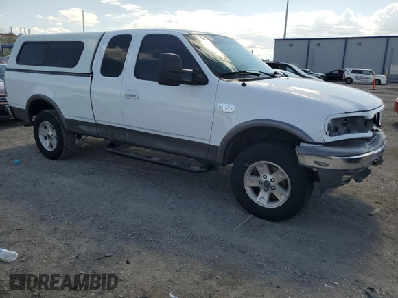 2002 Ford F-150 XL z VIN 1FTRX18L42NB40419, wystawiony jako Copart lot #60486205 z przebiegiem 241 853 mil mil oraz Szkoda całkowita • Salvage title. Historia ofert i sprzedaży dostępna na DreamBid. Obrazek 4.