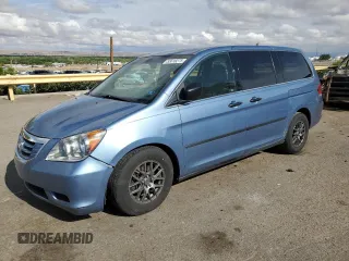 2010 Honda Odyssey LX with VIN 5FNRL3H23AB054658, listed as a Copart auction lot 62322195 with 160,550 mi miles and Salvage title. Bid and sale history available at DreamBid. Image 1.