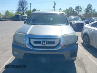 2010 Honda Pilot Touring with VIN 5FNYF4H94AB031167, listed as a IAAI auction lot 41800738 with 184,126 mi miles and . Bid and sale history available at carsss.com. Image 12.