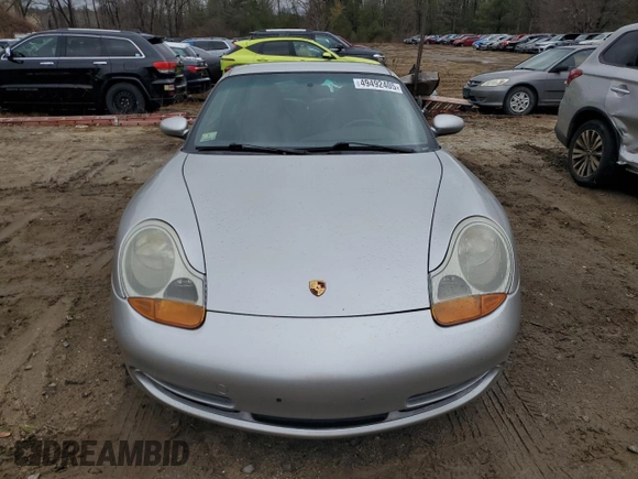 1999 Porsche 911 z VIN WP0AA2992XS621138, wystawiony jako Copart lot #49492405 z przebiegiem 148 064 mil mil oraz Czysty tytuł • Clean title. Historia ofert i sprzedaży dostępna na DreamBid. Obrazek 5.