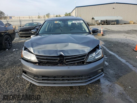 2016 Volkswagen Jetta SEL with VIN 3VWL17AJ3GM309914, listed as a Copart auction lot 51681525 with 132,154 mi miles and Salvage title. Bid and sale history available at DreamBid. Image 5.