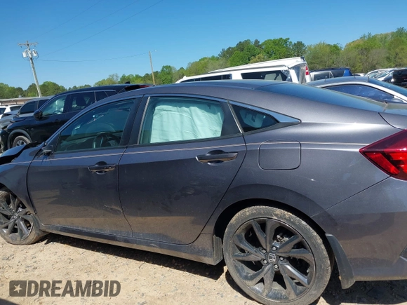 2019 Honda Civic Sport with VIN 19XFC2F88KE028035, listed as a IAAI auction lot 42000936 with 51,666 mi miles and . Bid and sale history available at DreamBid. Image 13.