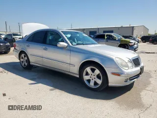 2005 Mercedes-Benz E 5.0L with VIN WDBUF70J95A718132, listed as a Copart auction lot 51620185 with 249,876 mi miles and Salvage Title. Bid and sale history available at carsss.com. Image 4.