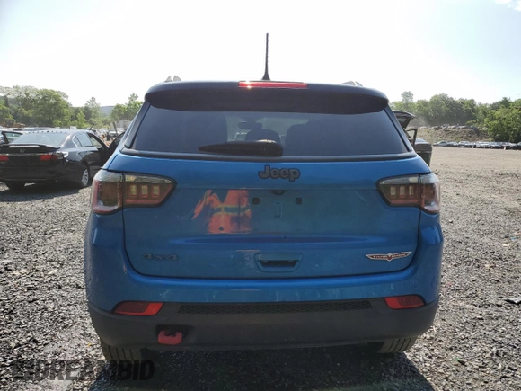 2018 Jeep Compass Trailhawk with VIN 3C4NJDDB7JT179423, listed as a Copart auction lot 61458605 with 100,949 mi miles and Salvage title. Bid and sale history available at DreamBid. Image 6.