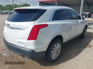 2017 Cadillac XT5 FWD with VIN 1GYKNARS0HZ107734, listed as a IAAI auction lot 41882031 with 89,397 mi miles. Bid and sale history available at carsss.com. Image 4.