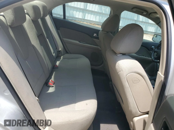 2010 Ford Fusion Hybrid с VIN 3FADP0L33AR171285, выставлен на аукционе Copart как лот 64983995 с пробегом 166 596 миль миль и Чистый • Clean title. История ставок и продаж доступна на DreamBid. Изображение 10.