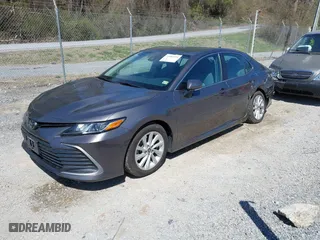 2022 Toyota Camry LE with VIN 4T1C11AK2NU054251, listed as a IAAI auction lot 41880293 with 48,559 mi miles. Bid and sale history available at carsss.com. Image 2.