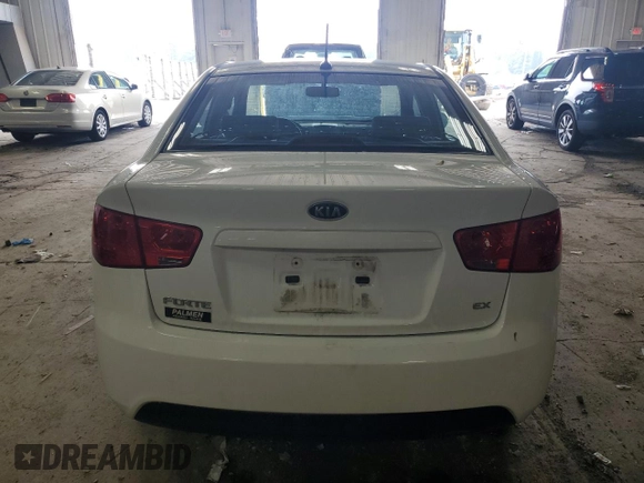 2010 Kia Forte EX z VIN KNAFU4A27A5230657, wystawiony jako Copart lot #58817345 z przebiegiem 63 949 mil mil oraz Nie do naprawy • Non repairable. Historia ofert i sprzedaży dostępna na DreamBid. Obrazek 6.