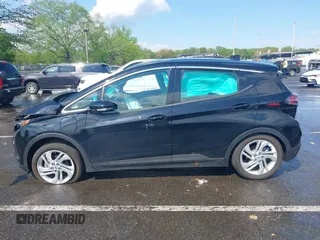 2023 Chevrolet Bolt EV 1LT z VIN 1G1FW6S00P4194095, wystawiony jako IAAI lot #42168182 z przebiegiem 9 122 mil mil oraz . Historia ofert i sprzedaży dostępna na DreamBid. Obrazek 14.
