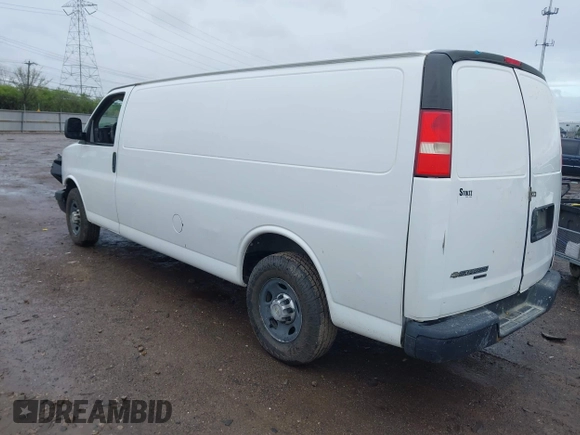 2014 Chevrolet Express Cargo Van with VIN 1GCWGGCA0E1155572, listed as a IAAI auction lot 41965353 with 324,538 mi miles. Bid and sale history available at carsss.com. Image 3.
