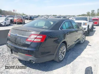 2014 Ford Taurus Limited with VIN 1FAHP2F80EG105147, listed as a IAAI auction lot 41899174 with 137,451 mi miles and . Bid and sale history available at DreamBid. Image 4.