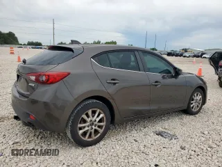 2015 Mazda 3 i Grand Touring with VIN JM1BM1M79F1226521, listed as a Copart auction lot 60328335 with 104,079 mi miles and Salvage title. Bid and sale history available at DreamBid. Image 3.