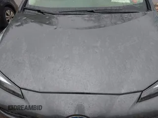 2021 Toyota Prius L Eco with VIN JTDKAMFU6M3140081, listed as a IAAI auction lot 42131187 with 103,973 mi miles and . Bid and sale history available at DreamBid. Image 6.