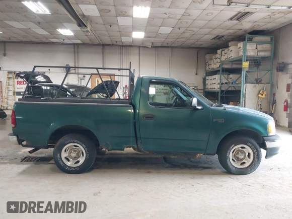 2000 Ford F-150 XL with VIN 2FTZF1722YCA27112, listed as a IAAI auction lot 42687404 with Not provided miles and . Bid and sale history available at DreamBid. Image 14.