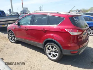 2014 Ford Escape Titanium with VIN 1FMCU0JX8EUC19300, listed as a IAAI auction lot 42138925 with 111,709 mi miles. Bid and sale history available at carsss.com. Image 3.