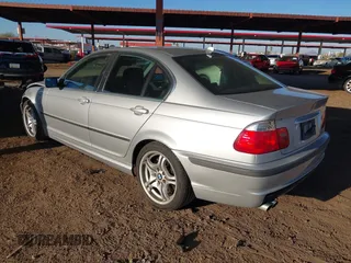 2005 BMW 3 Series 330i with VIN WBAEV53475KM43130, listed as a IAAI auction lot 41361364 with 152,382 mi miles. Bid and sale history available at carsss.com. Image 3.