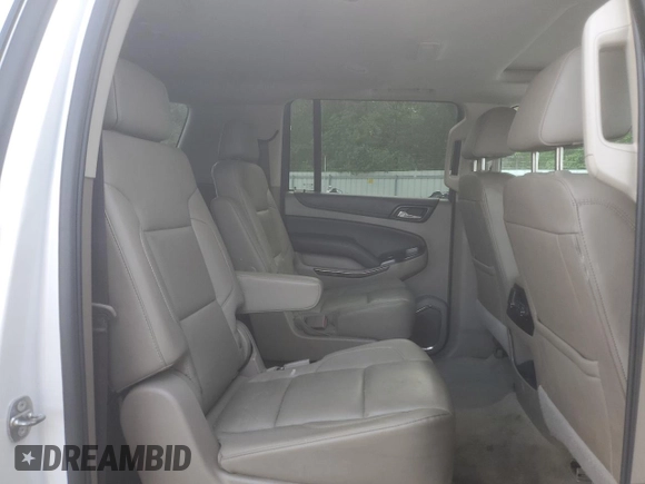 2017 Chevrolet Suburban LT z VIN 1GNSCHKC8HR330084, wystawiony jako Copart lot #52335325 z przebiegiem Nie podano mil oraz Szkoda całkowita • Salvage title. Historia ofert i sprzedaży dostępna na DreamBid. Obrazek 11.