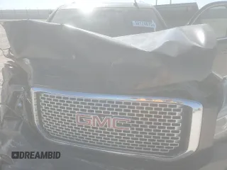 2015 GMC Yukon XL Denali with VIN 1GKS2JKJ3FR743050, listed as a Copart auction lot 50174675 with 143,154 mi miles and Salvage Title. Bid and sale history available at carsss.com. Image 12.