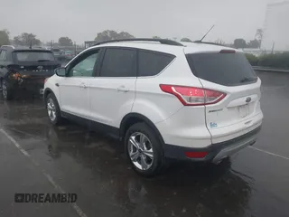 2016 Ford Escape SE with VIN 1FMCU0GX4GUC23998, listed as a IAAI auction lot 41917522 with 96,491 mi miles and . Bid and sale history available at carsss.com. Image 3.