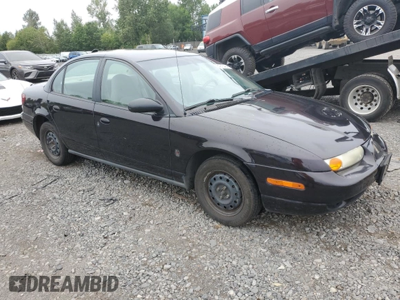 2000 Saturn SL z VIN 1G8ZH528XYZ160128, wystawiony jako Copart lot #64913404 z przebiegiem 172 587 mil mil oraz Czysty tytuł • Clean title. Historia ofert i sprzedaży dostępna na DreamBid. Obrazek 4.