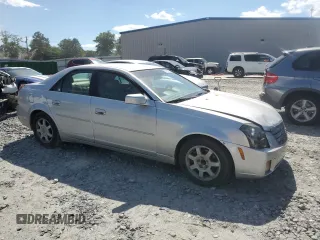 2004 Cadillac CTS with VIN 1G6DM577140143103, listed as a Copart auction lot 52082795 with 137,393 mi miles and Salvage title. Bid and sale history available at DreamBid. Image 4.