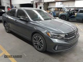 2024 Volkswagen Jetta Sport with VIN 3VWBM7BU0RM083944, listed as a IAAI auction lot 42533869 with 14,435 mi miles and . Bid and sale history available at DreamBid. Image 1.